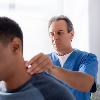 Doctors perform diagnostic examinations of patients with neck pain