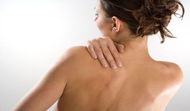 The woman was worried about pain under the left shoulder blade in the back from behind